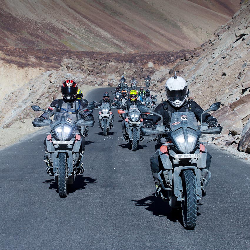 KTM Adventure 390 rider in ladakh group photo on highway 