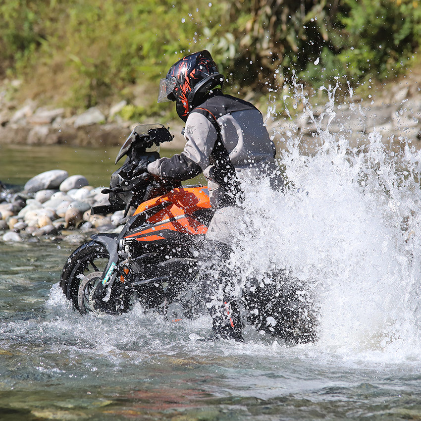 Sikkim KTM Adventure 390 rider crosing river