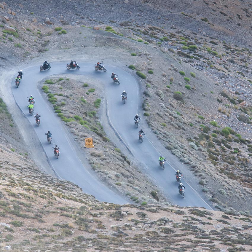 KTM Adventure 390 rider at Ladakh group riding on curve road